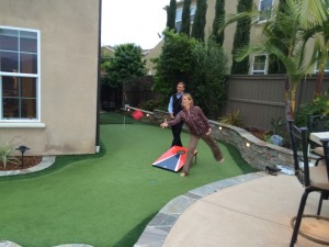 SRA owners playing cornhole